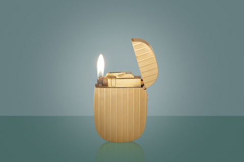 Read The Curious Case of the Patek Philippe Golden Ellipse Lighter | Articles and Interviews A Collected Man