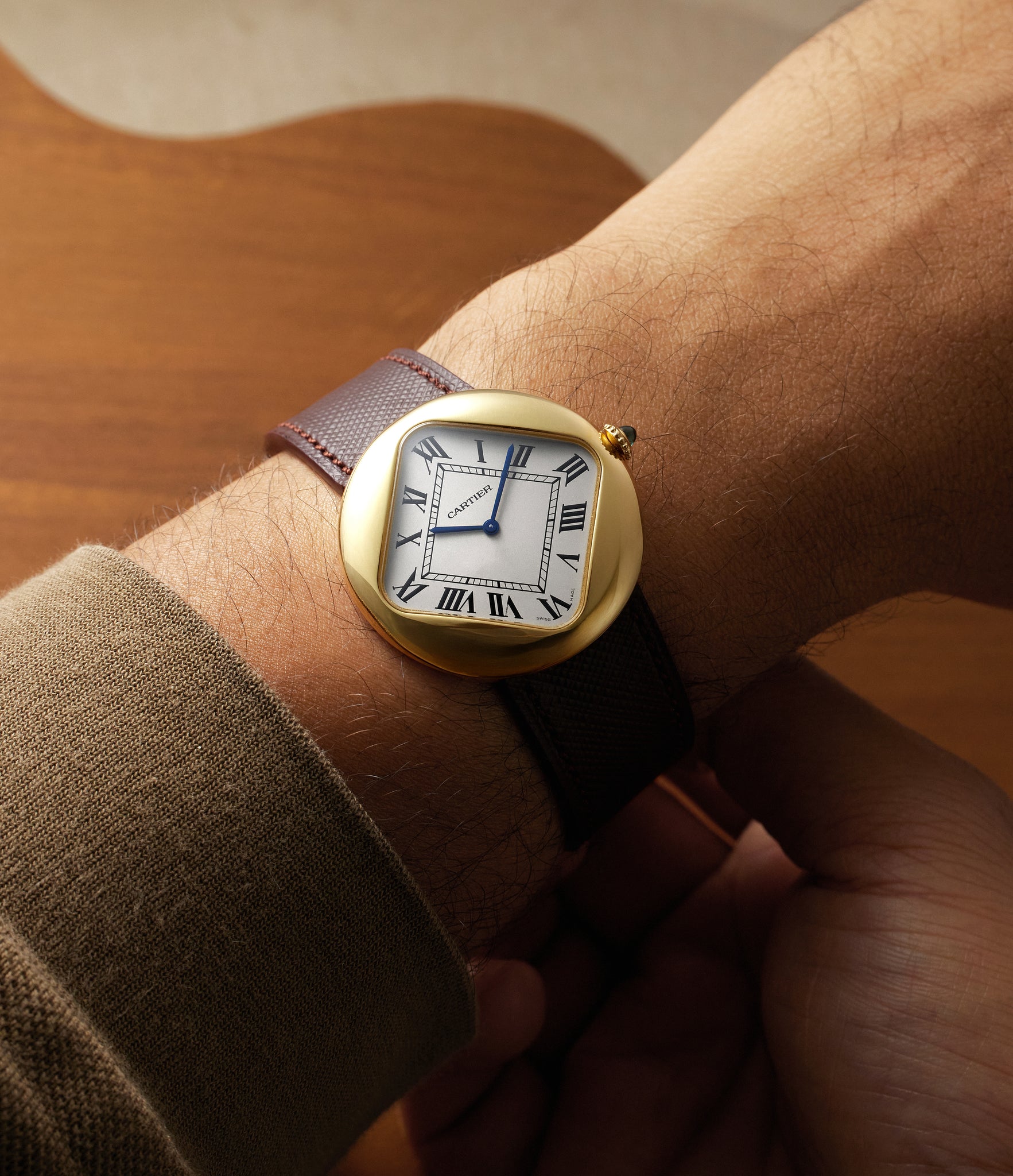 on the wrist Cartier Pebble CRWGPB0003 Yellow Gold preowned watch at A Collected Man London