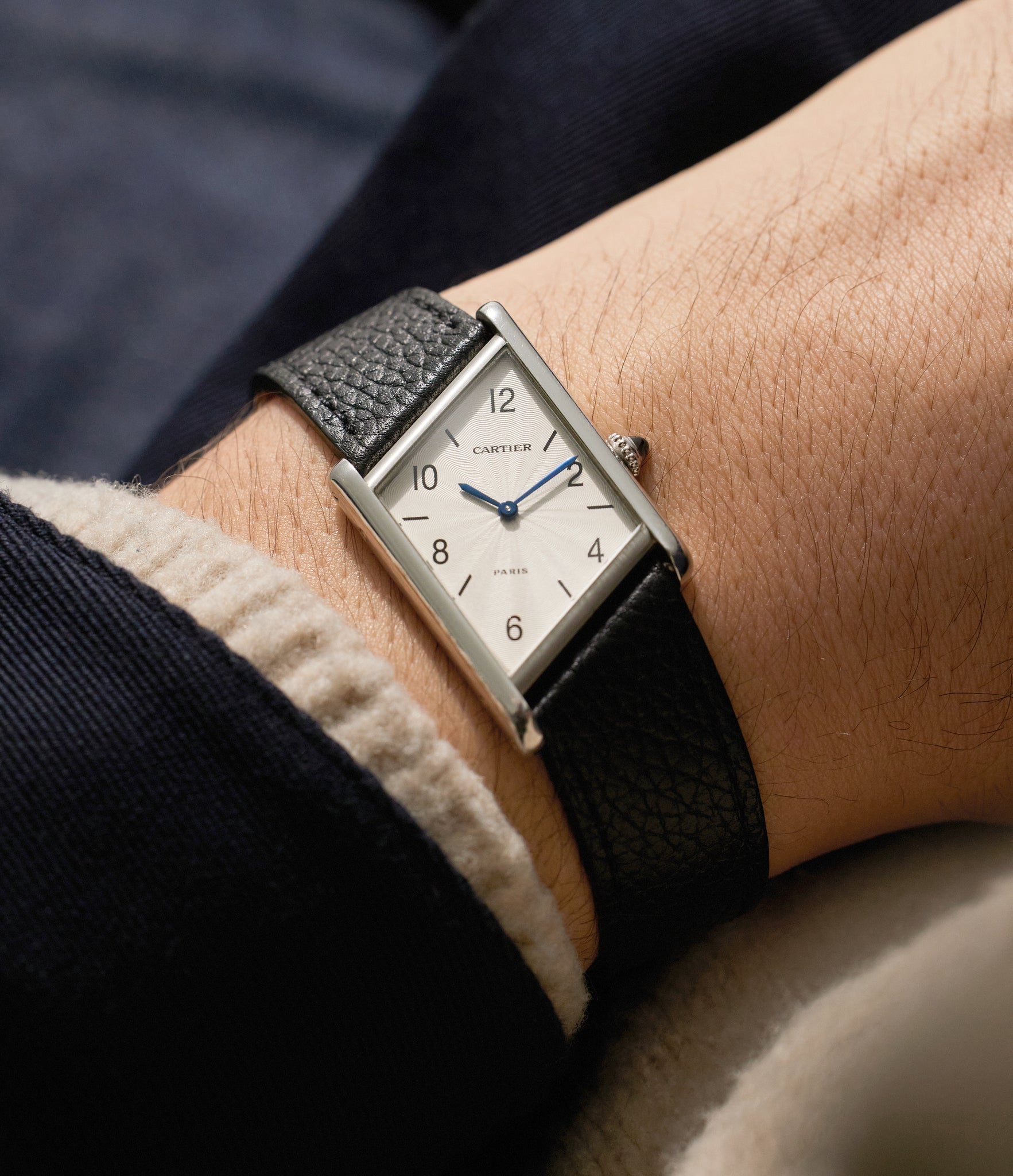 on the wrist Cartier Tank Asymétrique 2488 Platinum preowned watch at A Collected Man London