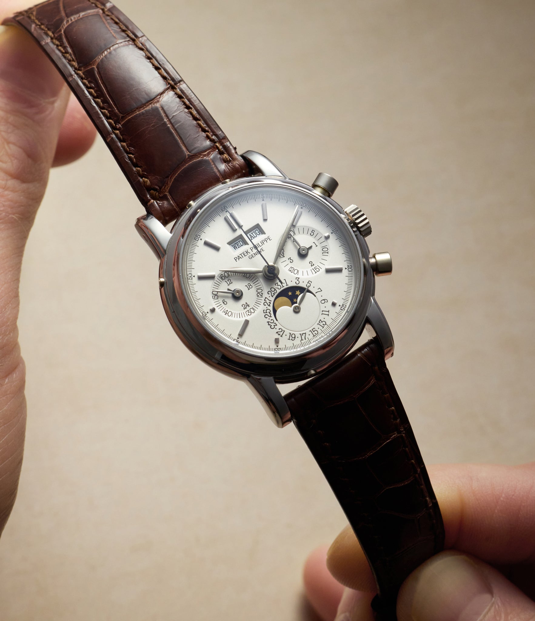 in hand Patek Philippe Perpetual Calendar Chronograph 3970E Platinum preowned watch at A Collected Man London