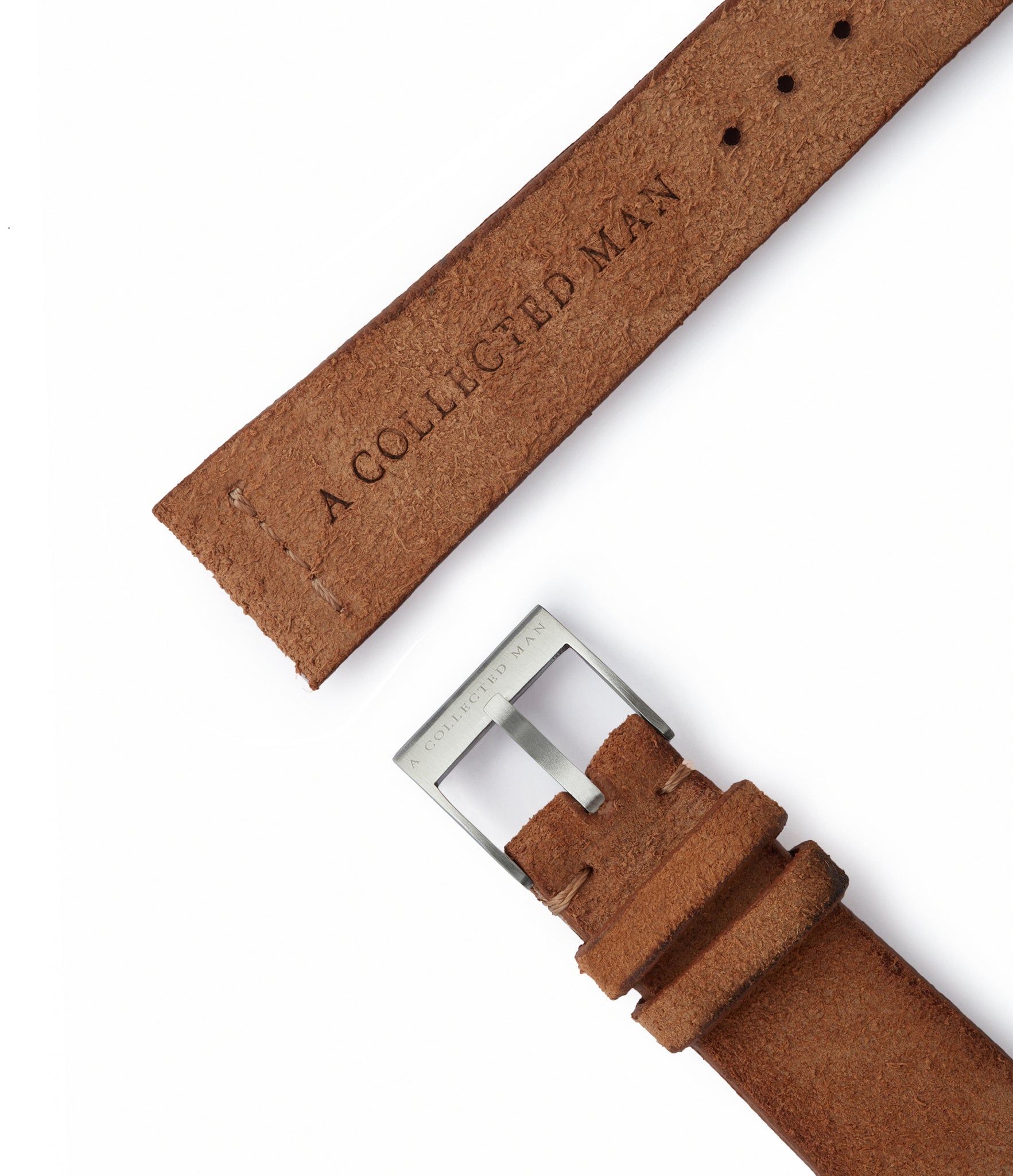 Buy rugged suede quality watch strap in burnt tawny brown from A Collected Man London, in short or regular lengths. We are proud to offer these hand-crafted watch straps, thoughtfully made in Europe, to suit your watch. Available to order online for worldwide delivery.