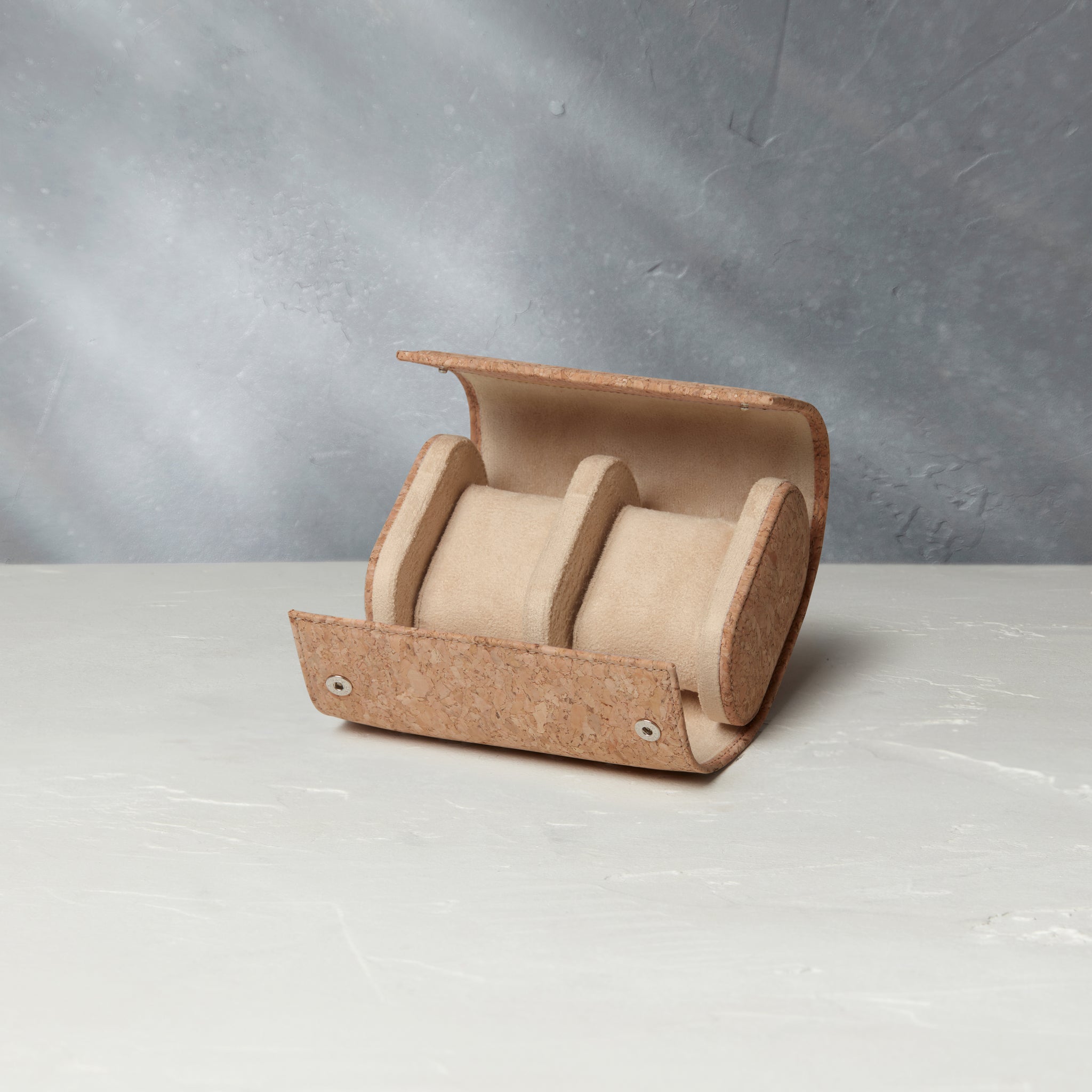 Two-watch oval-shaped roll in cork, stylish and secure home for your favourite watches, designed with travelling or daily storage in mind