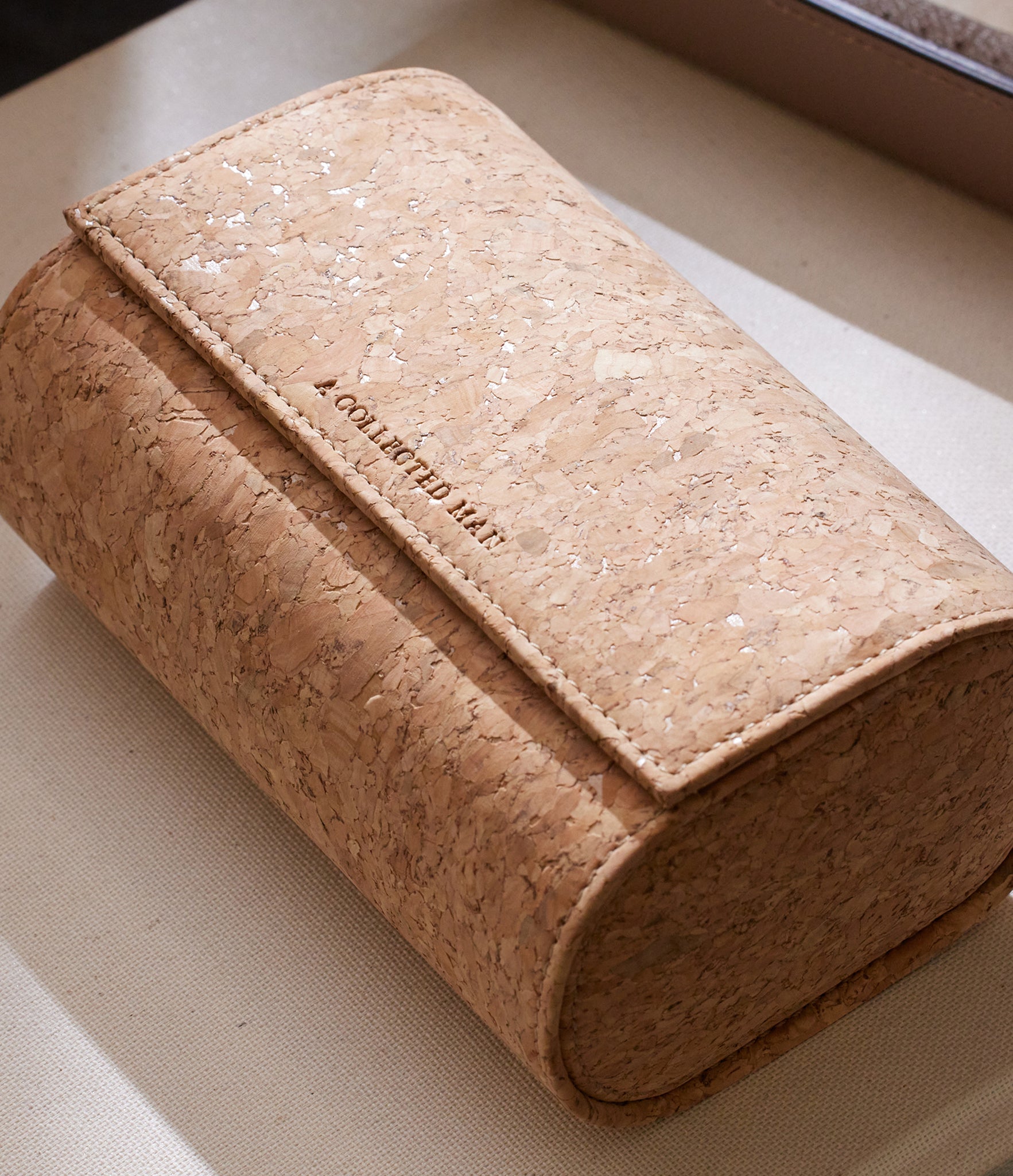 Two-watch oval-shaped roll in cork, stylish and secure home for your favourite watches, designed with travelling or daily storage in mind