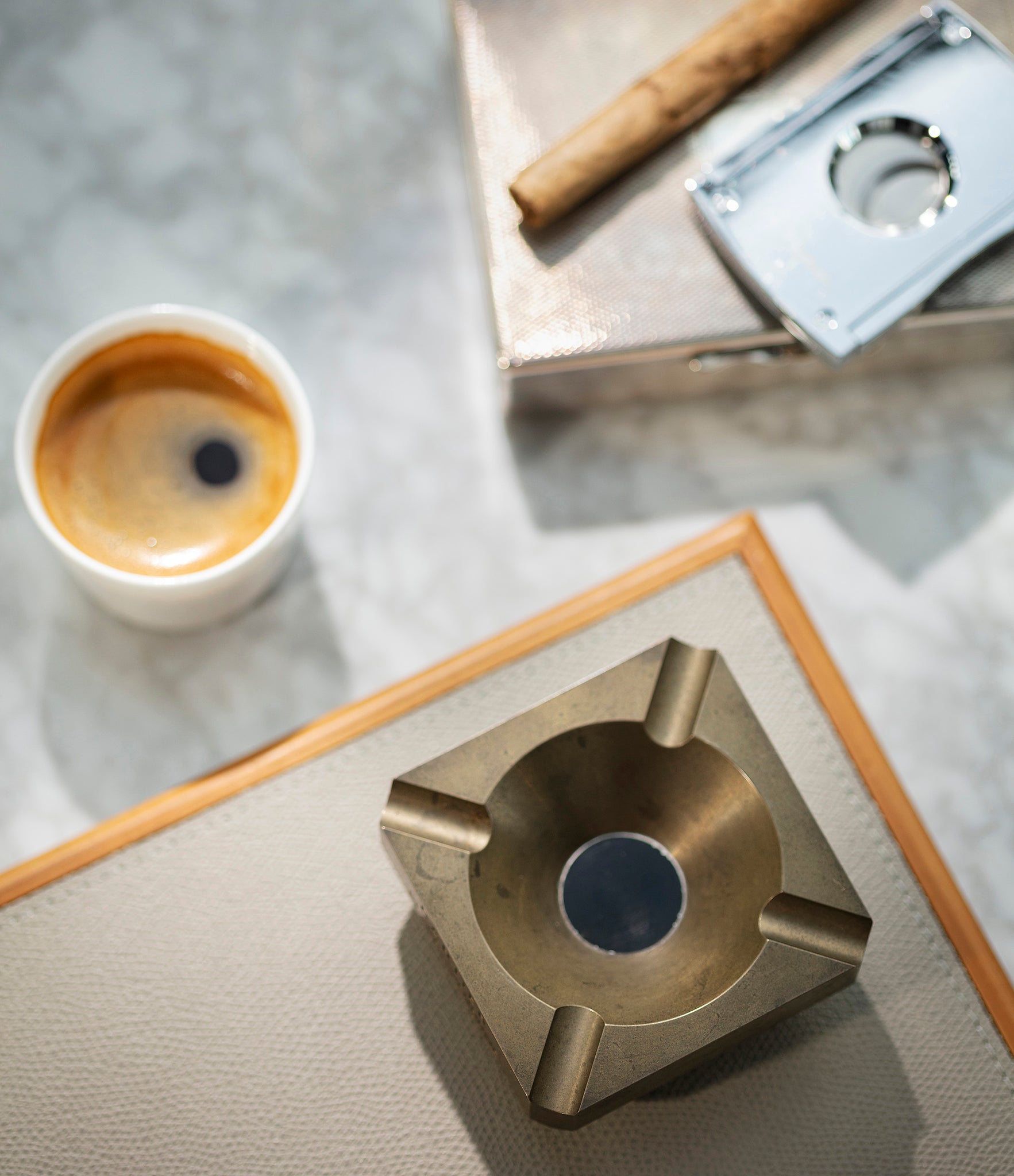 Photo from above of vintage collectable Cartier bronze ashtray available to buy at A Collected Man London