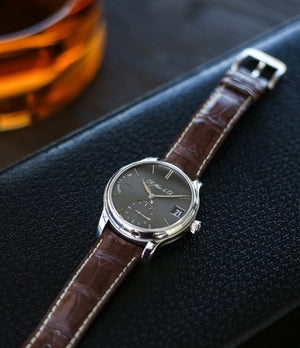 buy H. Moser & Cie. Perpetual Calendar 1341 platinum preowned dress watch at A Collected Man