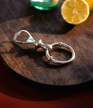 selling luxury vintage Hermès collectable bottle opener in silver tone at A Collected Man London