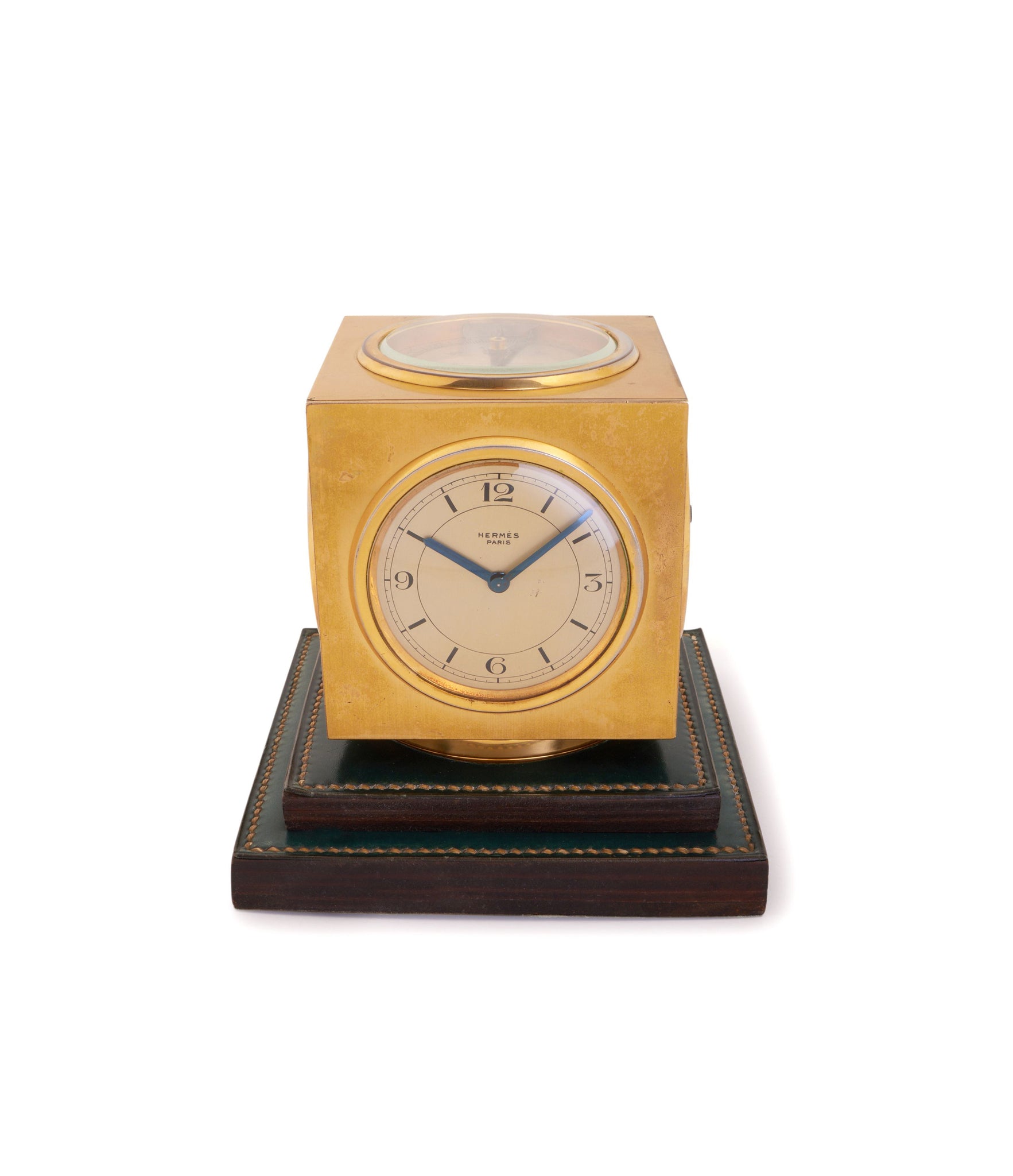 side-shot Front shot of a vintage Hermes Paris Compendium 8-day Art Deco brass calendar desk clock for sale online at A Collected Man London