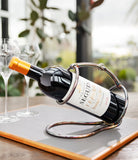 Rare vintage hermes silver wine bottle holder available to buy from A Collected Man London