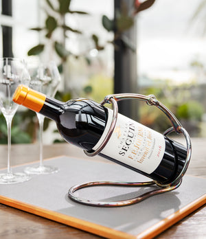 Rare vintage hermes silver wine bottle holder available to buy from A Collected Man London