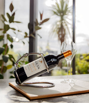 Rare vintage hermes silver wine bottle holder available to buy from A Collected Man London