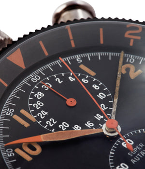 Close up of black dial on rare vintage Heuer Super Autavia Dashboard Timer with black dial available to buy at A Collected Man