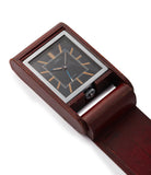 rare Jaeger-LeCoultre travel alarm clock with black dial and brown case at A Collected Man London