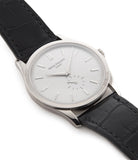 Patek Philippe Calatrava 5196G-001 18-carat white gold manual-winding pre-owned watch with silver dial and black strap