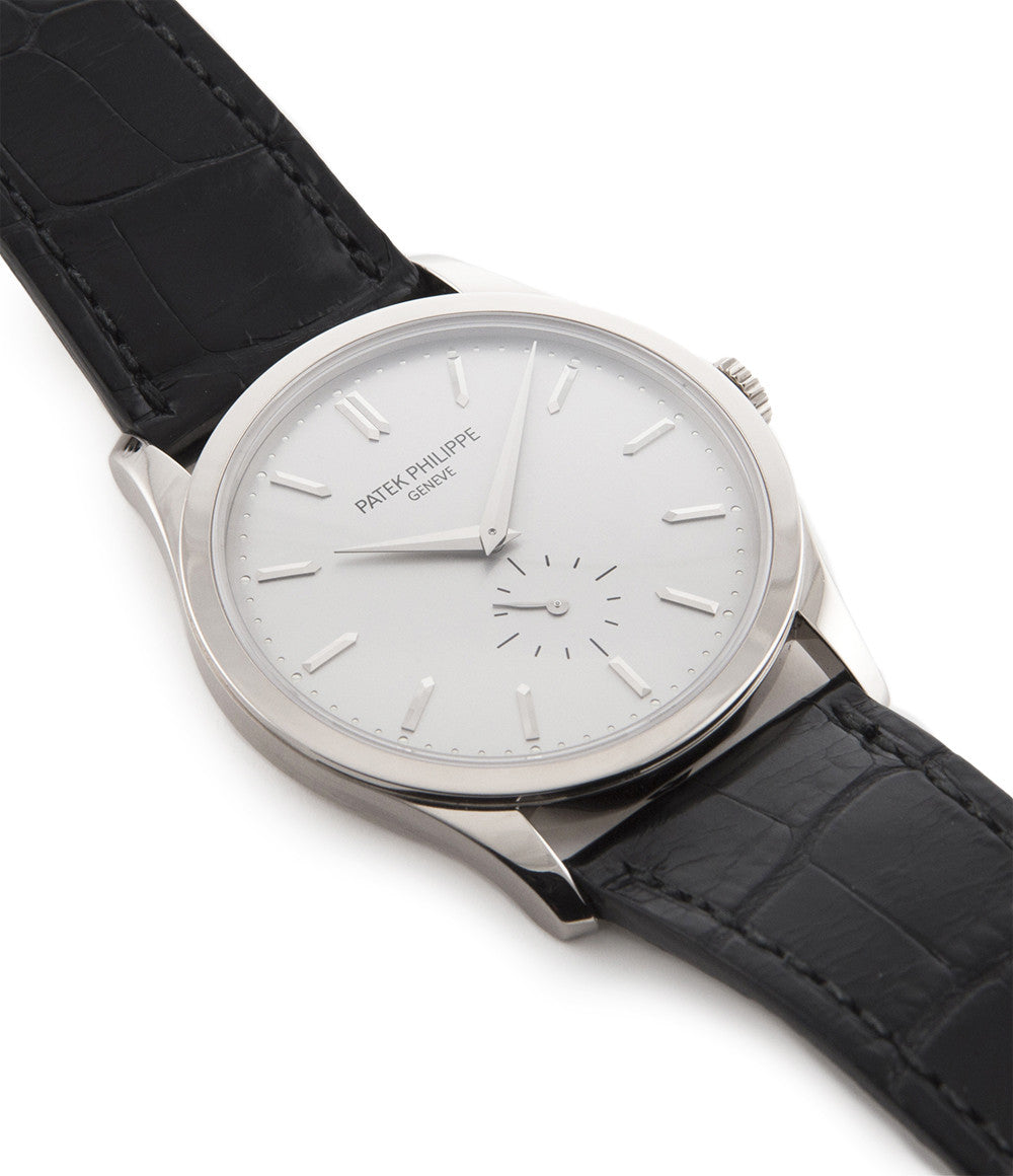 Patek Philippe Calatrava 5196G-001 18-carat white gold manual-winding pre-owned watch with silver dial and black strap