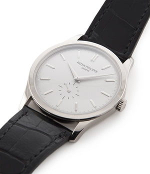 Patek Philippe Calatrava 5196G-001 18-carat white gold manual-winding pre-owned watch with silver dial and black strap