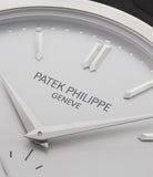 Patek Philippe Calatrava 5196G-001 18-carat white gold manual-winding pre-owned watch with silver dial and black strap