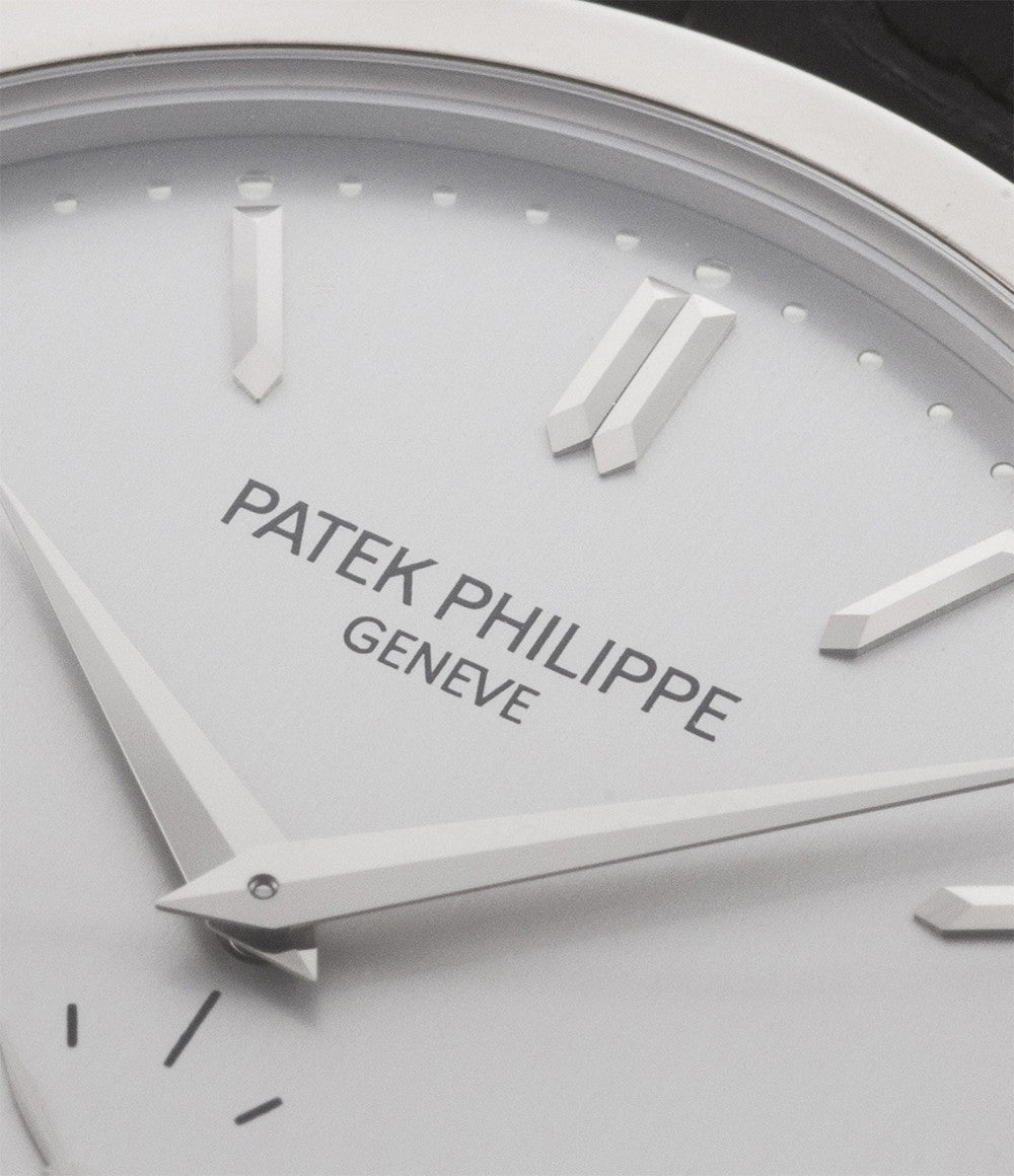 Patek Philippe Calatrava 5196G-001 18-carat white gold manual-winding pre-owned watch with silver dial and black strap