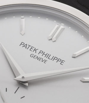 Patek Philippe Calatrava 5196G-001 18-carat white gold manual-winding pre-owned watch with silver dial and black strap