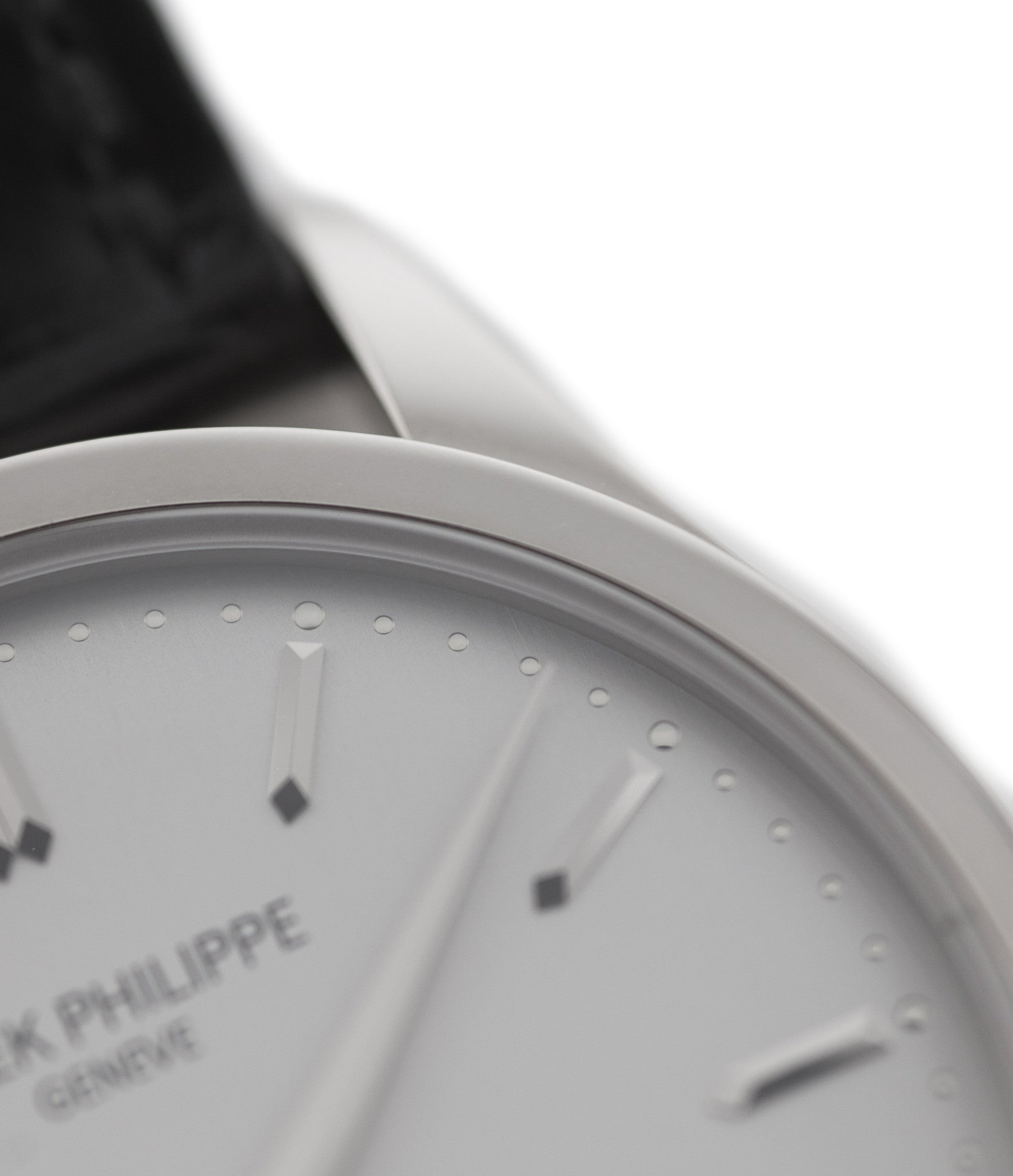 Patek Philippe Calatrava 5196G-001 18-carat white gold manual-winding pre-owned watch with silver dial and black strap