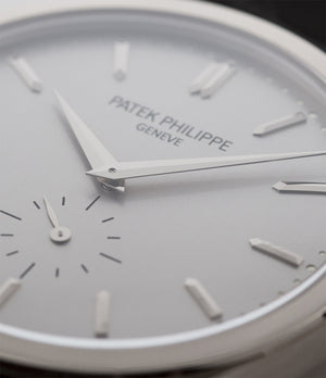 Patek Philippe Calatrava 5196G-001 18-carat white gold manual-winding pre-owned watch with silver dial and black strap