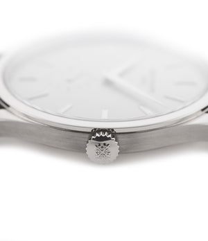 Patek Philippe Calatrava 5196G-001 18-carat white gold manual-winding pre-owned watch with silver dial and black strap
