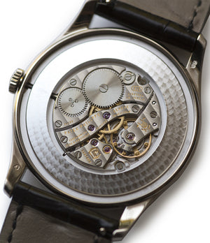 Patek Philippe Calatrava 5196G-001 18-carat white gold manual-winding pre-owned watch with silver dial and black strap