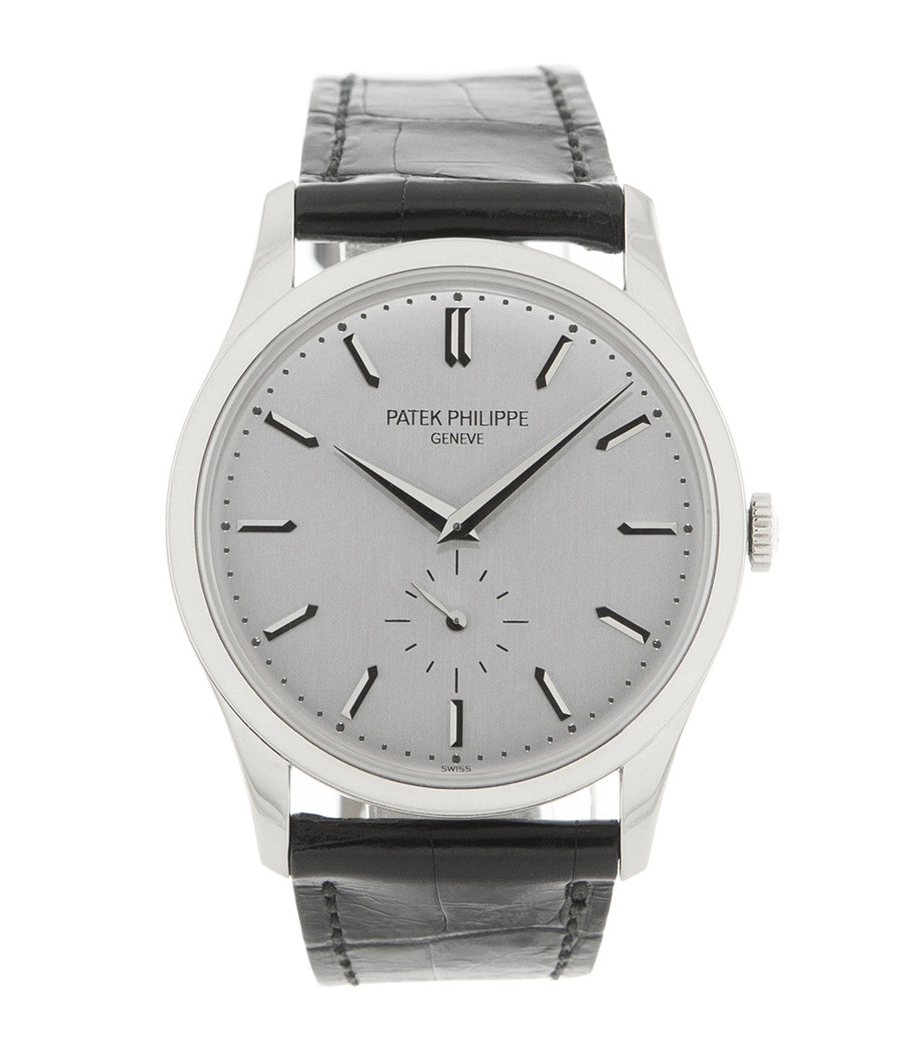 Patek Philippe Calatrava 5196G-001 18-carat white gold manual-winding pre-owned watch with silver dial and black strap
