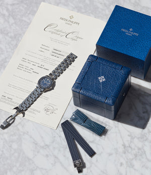 full set pre-owned Patek Philippe Aquanaut 5066A-010 Japanese steel blue dial sports watch for sale online A Collected Man London