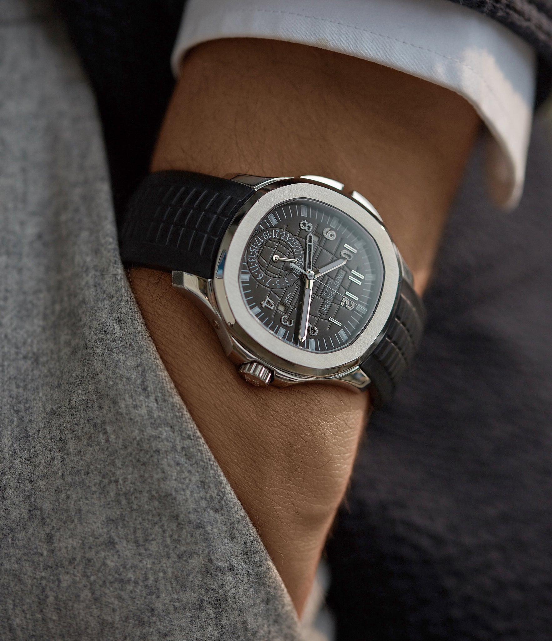 men's luxury wristwatch Patek Philippe Aquanaut Travel-time 5164A-001 steel sports traveller pre-owned watch for sale online at A Collected Man London specialist rare watches