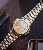 for sale Patek Philippe Nautilus Ref. 3800-001J yellow gold dark date disc luxury sports watch for sale online A Collected Man London UK specialist rare watches