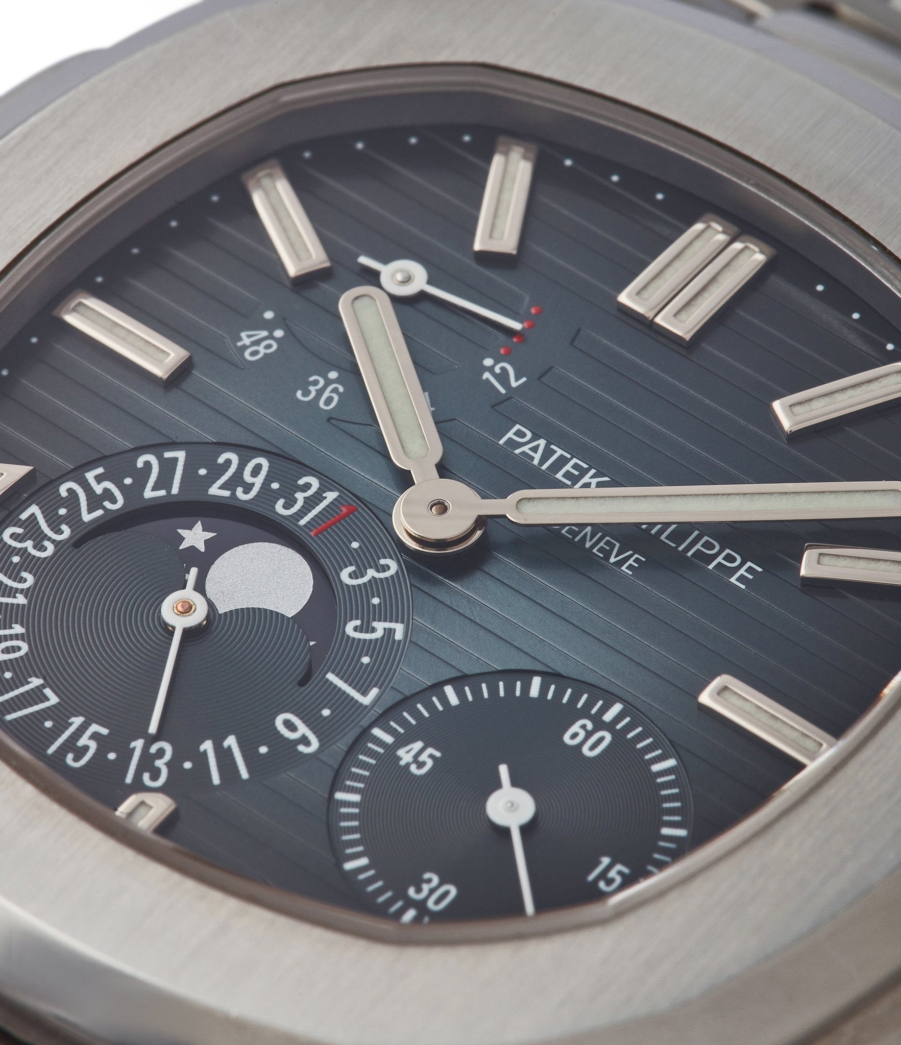 blue dial Patek Philippe Nautilus moon phase 5712/1A-001 steel moon phase luxury sports watch for sale online A Collected Man London UK specialist rare watches