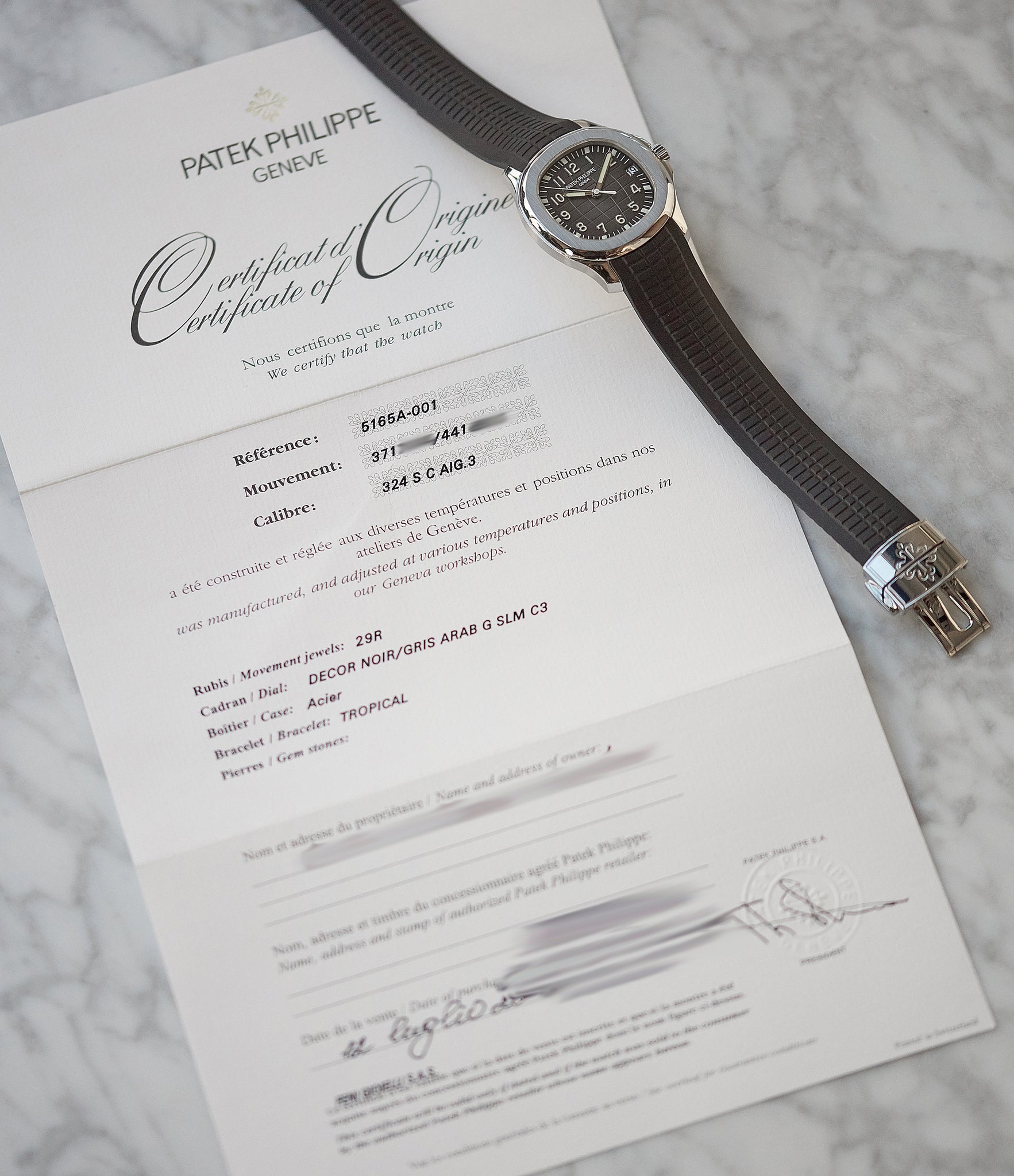 certificate of origin Patek Philippe Aquanaut 5165A-001 transitional steel sport watch for sale online at A Collected Man London UK specialist of rare watches