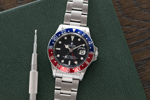 buy vintage Rolex GMT Master 1675 vintage steel traveller sport watch Pepsi bezel for sale online at A Collected Man London vintage watch specialist