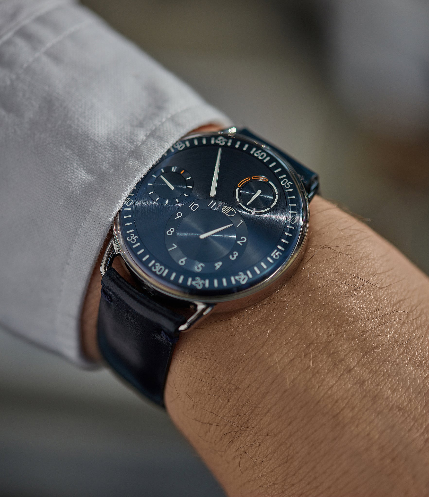 on the wrist Ressence Type 1N titanium blue dial independent watchmaker watch for sale online at A Collected Man London UK specialist of rare watches