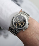buy Rolex Cosmograph Daytona with Patrizzi dial 16520 stainless steel automatic Cal. 4030 authentic pre-owned luxury watch from 1995 with black dial and stainless steel Rolex bracelet with chronograph, chronometer, hours, minutes, sub-seconds