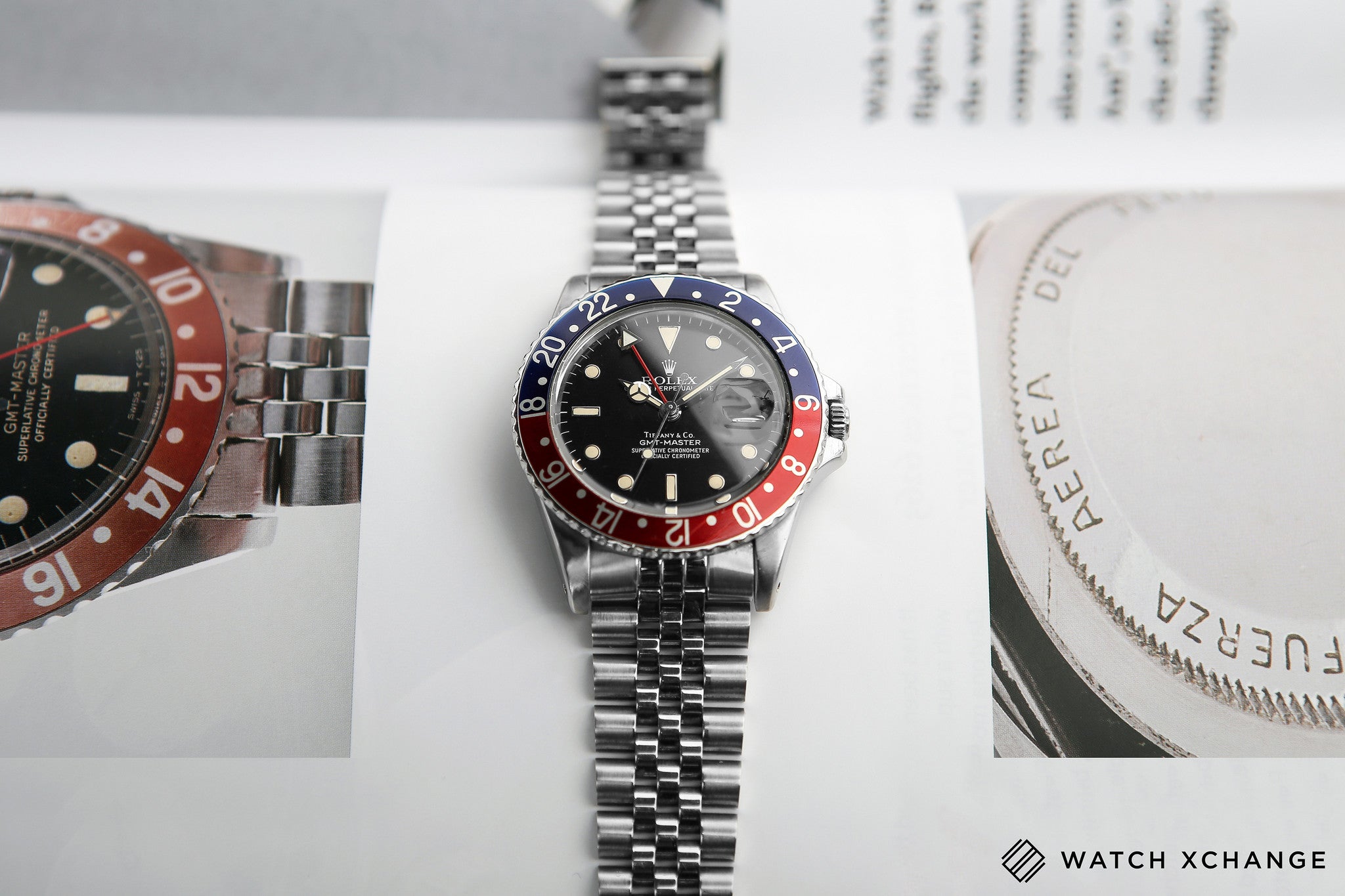 buy Rolex GMT Master with Tiffany dial 16750 stainless steel automatic Cal. 3075 vintage authentic pre-owned dress, sport luxury watch from 1984 with black dial and stainless steel Rolex bracelet with date, chronometer, gmt, hours, minutes, center seconds
