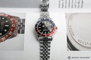 buy Rolex GMT Master with Tiffany dial 16750 stainless steel automatic Cal. 3075 vintage authentic pre-owned dress, sport luxury watch from 1984 with black dial and stainless steel Rolex bracelet with date, chronometer, gmt, hours, minutes, center seconds