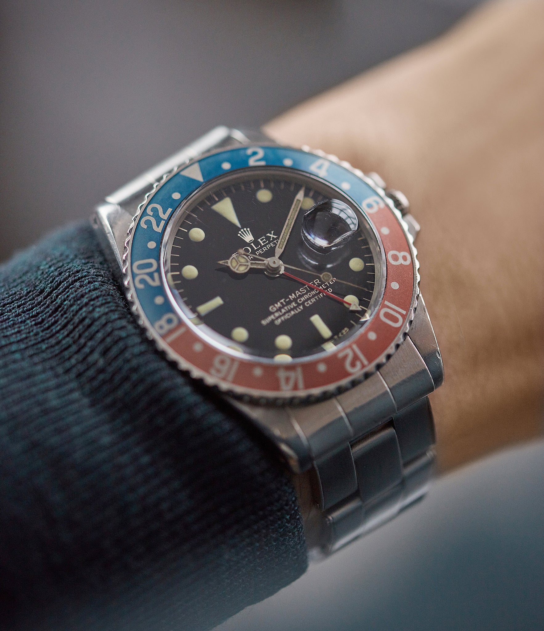 on the wrist vintage Rolex GMT-Master 1675 Gilt dial full set sports watch for sale online at A Collected Man London UK specialist of rare watches