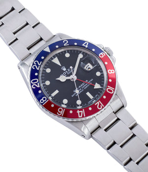 buy Rolex GMT Master 1675 vintage steel traveller sport watch Pepsi bezel for sale online at A Collected Man London vintage watch specialist