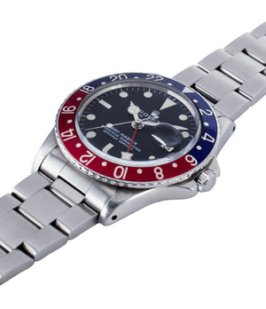 selling Rolex GMT Master 1675 vintage steel traveller sport watch Pepsi bezel for sale online at A Collected Man London vintage watch specialist
