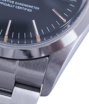 white gold index markers sigma dial Rolex 1500 steel black date sports vintage watch for sale online at A Collected Man vintage watch specialist