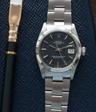 Rolex 1500 steel black sigma dial date sports vintage watch for sale online at A Collected Man vintage watch specialist