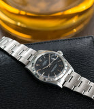selling vintage Rolex 1500 steel black sigma dial date sports watch for sale online at A Collected Man vintage watch specialist