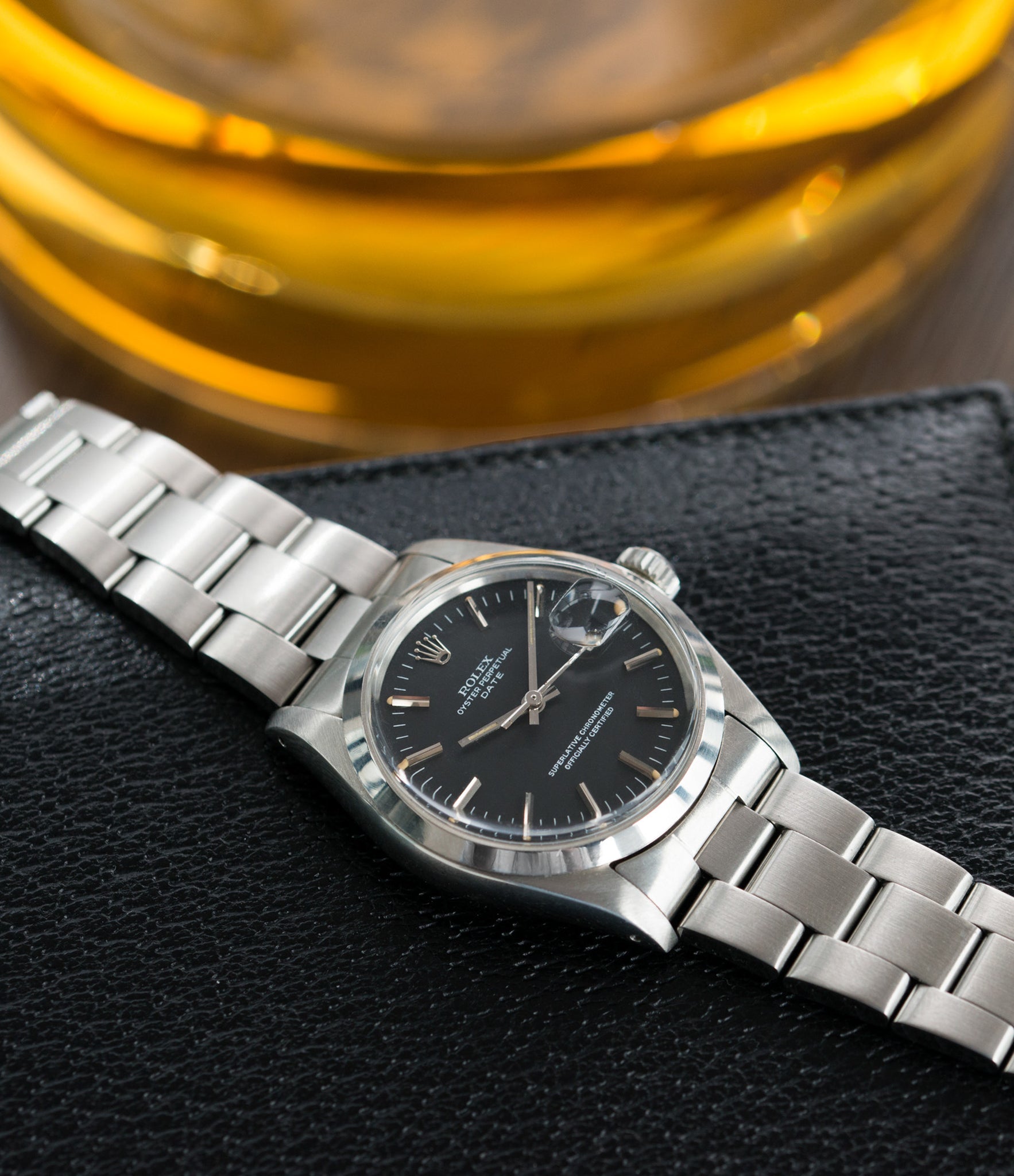 selling vintage Rolex 1500 steel black sigma dial date sports watch for sale online at A Collected Man vintage watch specialist