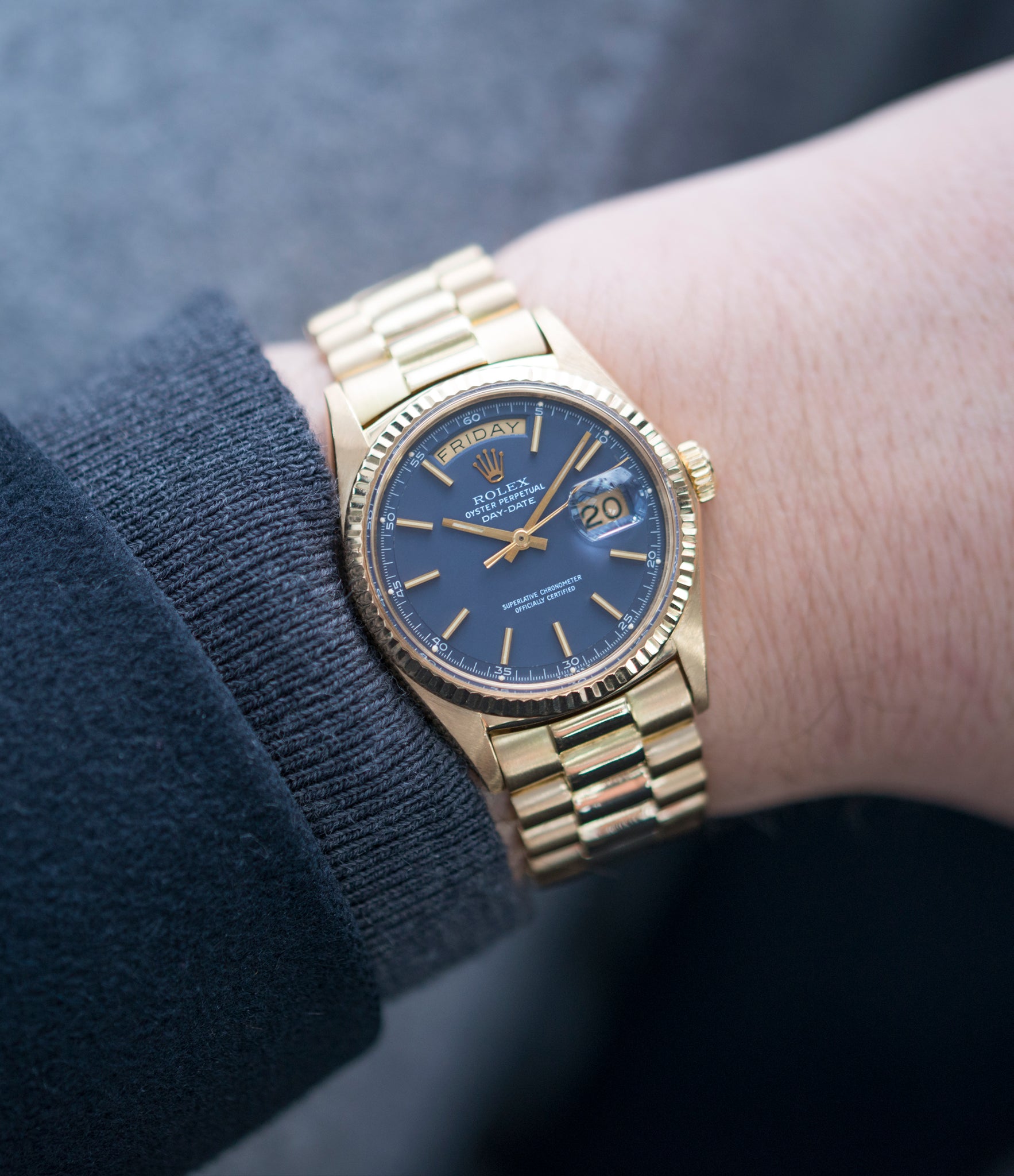 on the wrist vintage Rolex Day-Date 1803 Oyster Perpetual Cal. 1556 gold watch blue dial for sale online at A Collected Man London UK specialist of rare watches
