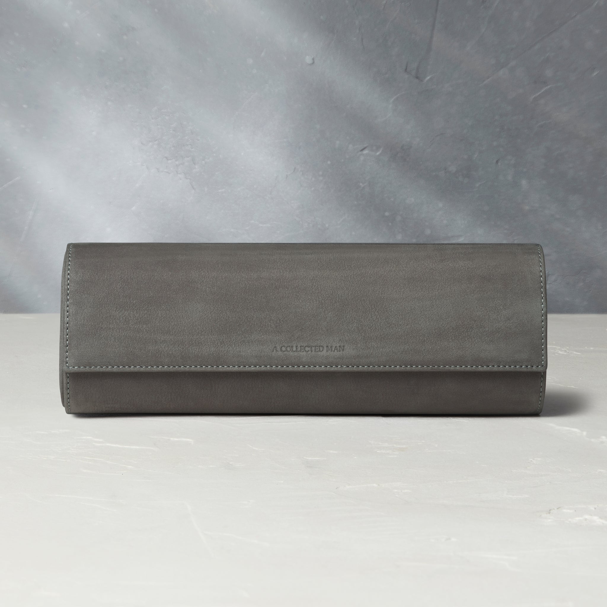 Rome, four-watch roll Four-watch oval-shaped roll in charcoal grey nubuck leather | A Collected Man | Available Worldwide