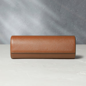 Rome, four-watch roll Four-watch oval-shaped roll in whisky-tan Saffiano leather | A Collected Man | Available Worldwide