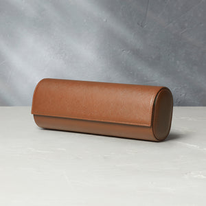 Rome, four-watch roll Four-watch oval-shaped roll in whisky-tan Saffiano leather | A Collected Man | Available Worldwide
