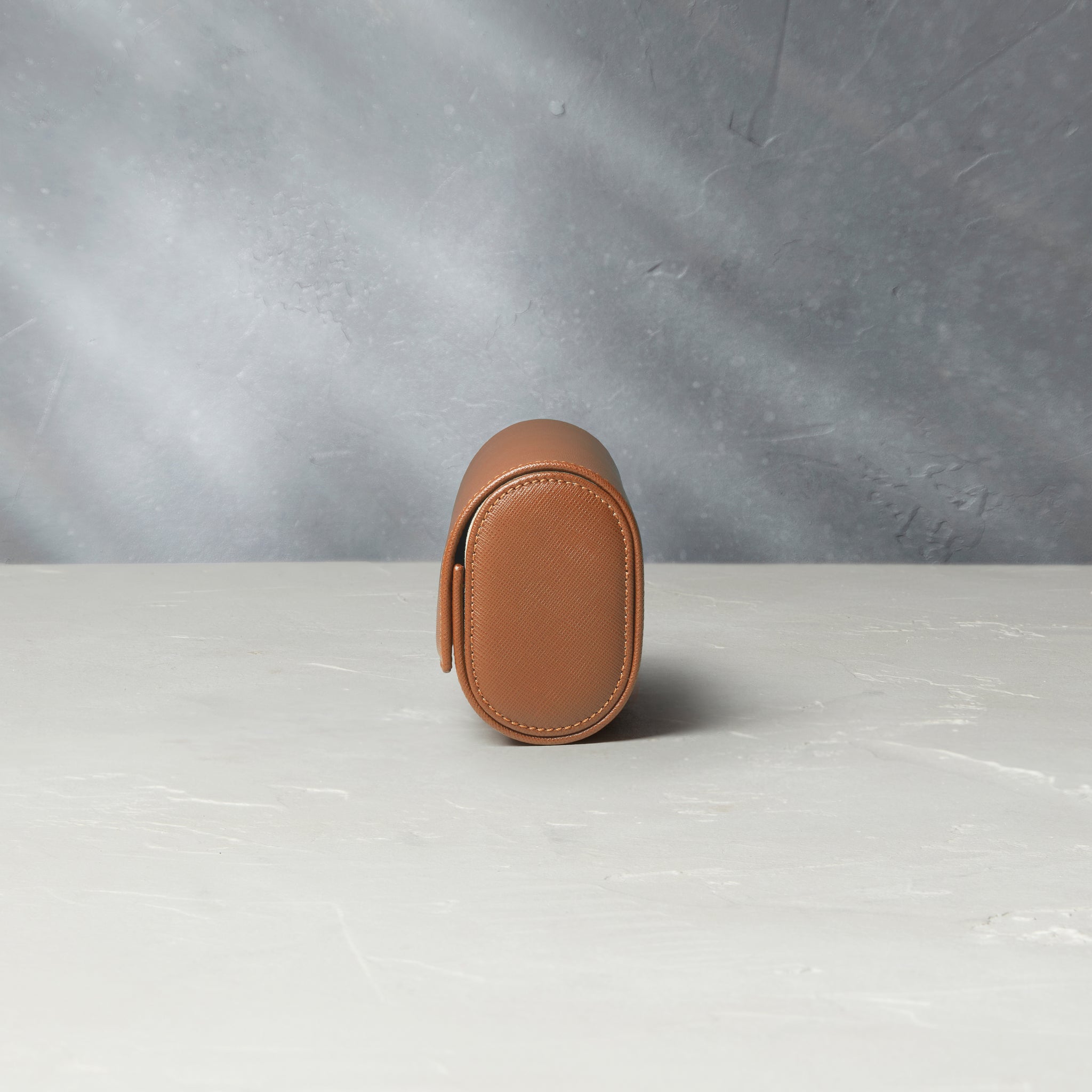 Rome, four-watch roll Four-watch oval-shaped roll in whisky-tan Saffiano leather | A Collected Man | Available Worldwide
