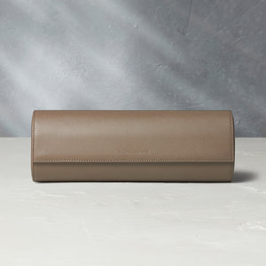 Rome, four-watch roll Four-watch oval-shaped roll in desert taupe Saffiano leather | A Collected Man | Available Worldwide